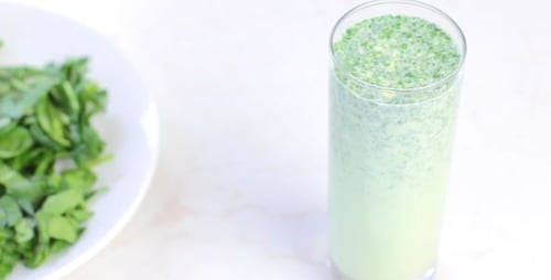 Making a Healthy Green Smoothie with Spinach and Avocado
