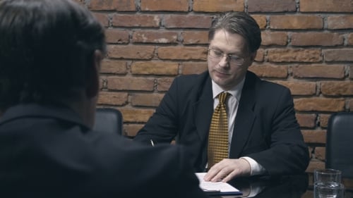 Businessmen Meeting to Sign Contract in Office