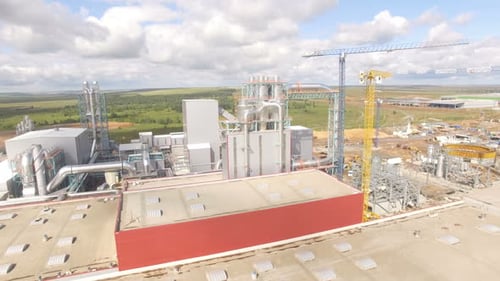 Motion Over Large Plant with Flat Roofs Pipes and Constructions