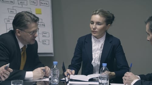 Business Meeting at a Conference Table