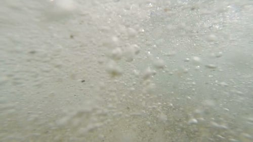 Bubbles Under Water. Bubbles Rising To the Surface of the Sea.