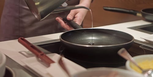 Chef Preparing Cooking Oil in Frying Pan