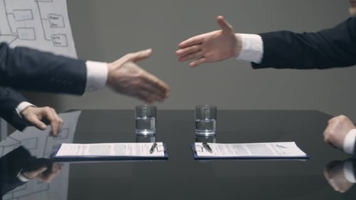 Businessmen Sealing the Deal with a Handshake