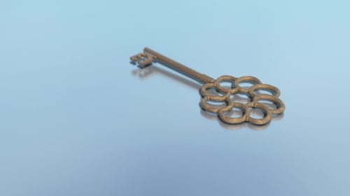 Antique Door Key ,Isolated, Is Falling on the Floor