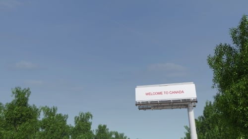 Approaching Big Highway Billboard with Welcome To Canada Caption