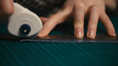 Close Up of Crafting with Rotary Cutter and Ruler