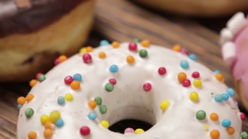 Delicious Donuts with Colorful Frosting and Toppings