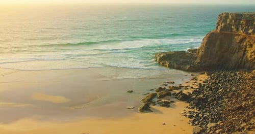 Tropical Golden Sunset Over Ocean Water in Slow Motion Static Shot
