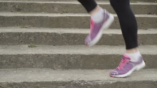 Legs Exercising on Concrete Steps in Daytime