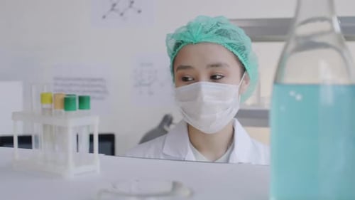 Asian Scientist in Lab