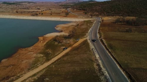 Autumn Driving Car On Road Along Lake