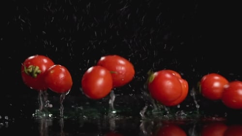 Tomatoes Falling in Water