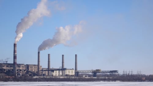 From the Pipes of an Industrial Plant Cloud in Sky