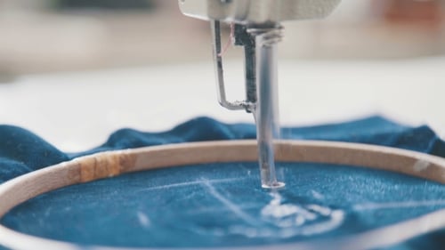 Embroidery Machine Needle in Textile Industry at Garment Manufacturers