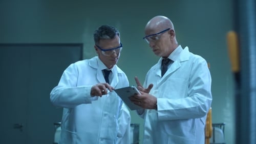 Two Scientists with the Tablet