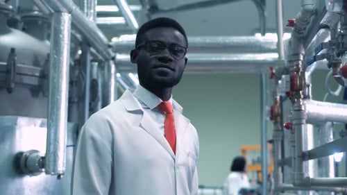 A Scientist Looking at Camera
