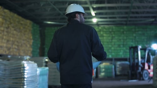 An Engineer with Blueprint