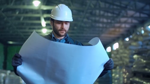 An Engineer with Blueprint