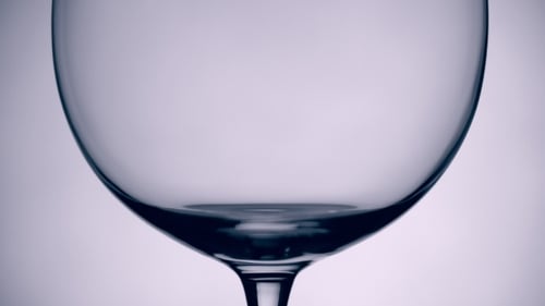 Water Pouring Into Glass in Close Up