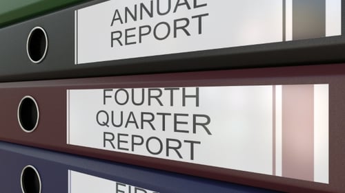 Office Binders with Quarter and Annual Reports Tags