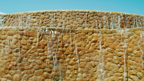 Decorative Rock Wall with Cascading Water Feature