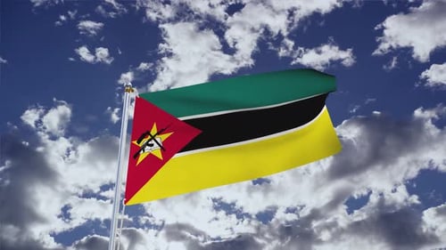 Realistic Waving Flag of Mozambique Against a Blue Sky