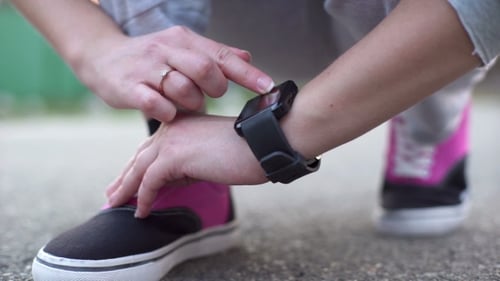Woman Using Smartwatch Device Close Up View