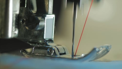 on a Sewing Machine Showing Process.