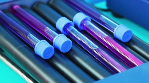 Purple Liquid in Lab Test Tubes on Shaker