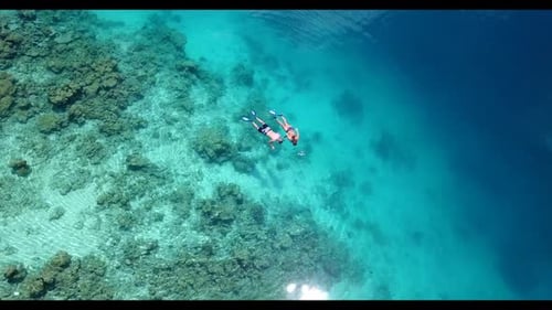 Guy and girl happy together on luxury sea view beach break by blue ocean and white sand background o