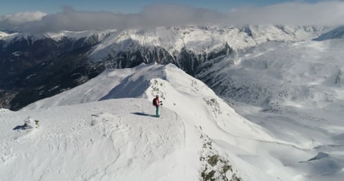 Aerial View of Mountain Panorama. Woman on Top