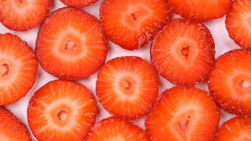 Rotating Background of Sliced Strawberry