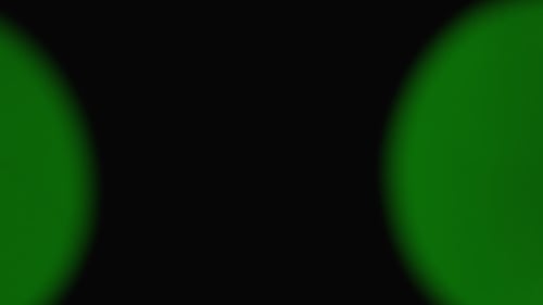 Hands Adjusting VR Headset With Green Screen Lenses