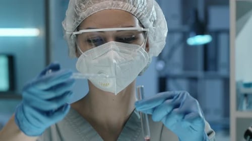 Woman Scientist Working in Medical Lab