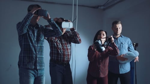 Architects and Designers in VR Headsets on the Site