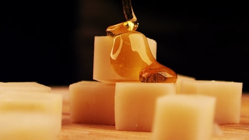 The Pieces of Cheese Are Pouring Honey