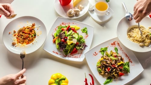 Top View of Hands Woman and Man Eat Soups and Italian Pasta with Salads