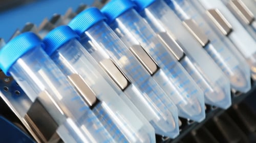 Machine mixing vials in a laboratory