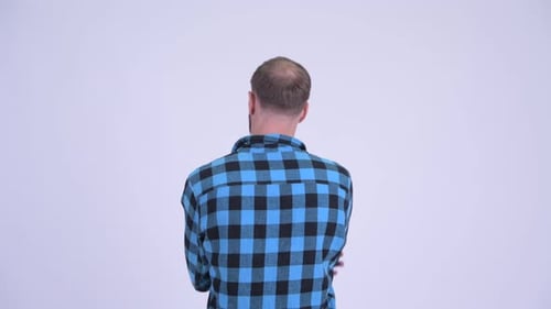 Rear View of Bearded Hipster Man Pointing Finger