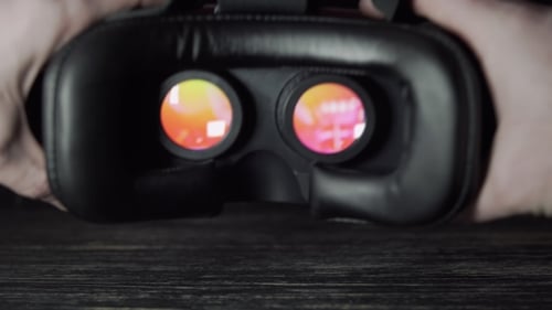 Close Up of VR Headset with Concert Reflection