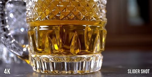 Cold Beer Poured into Decorative Glass Mug