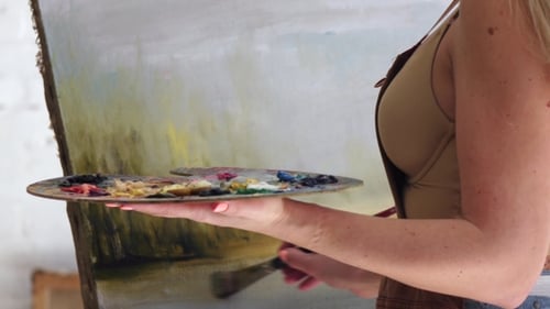 Woman Painting Abstract Art on Canvas