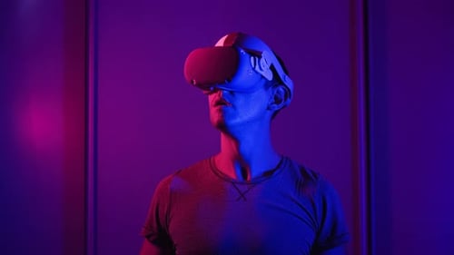 Man Wearing VR Headset in a Room