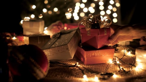 Christmas Gift Giving with Warm Glowing Lights