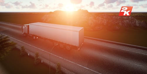 Semi-Truck Driving on Highway at Golden Hour