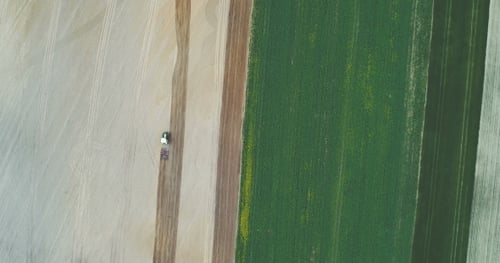 Aerial Shoot of Tractor Working on Field