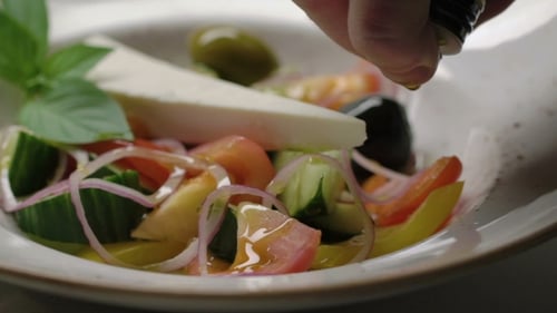Greek Salad is Dressed with Olive Oil