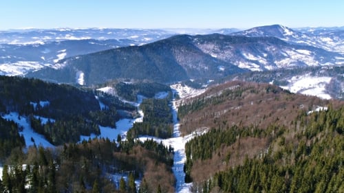 Aerial - Ski Lift at Ski Resort in Sunny Carpatian Mountains