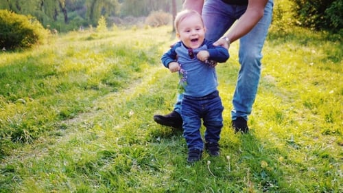 Funny Little Boy Learns To Walk