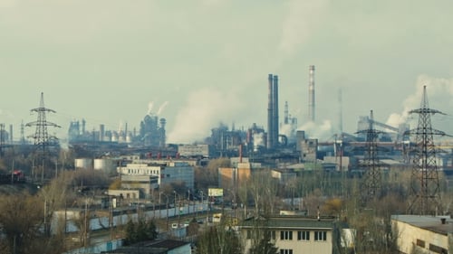 Air Pollution From Industrial Plants. Large Plant on the Background of the City